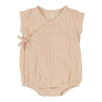 Lilette pink wrap romper from our Wrapover.