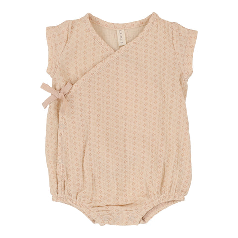 Lilette pink wrap romper from our Wrapover.